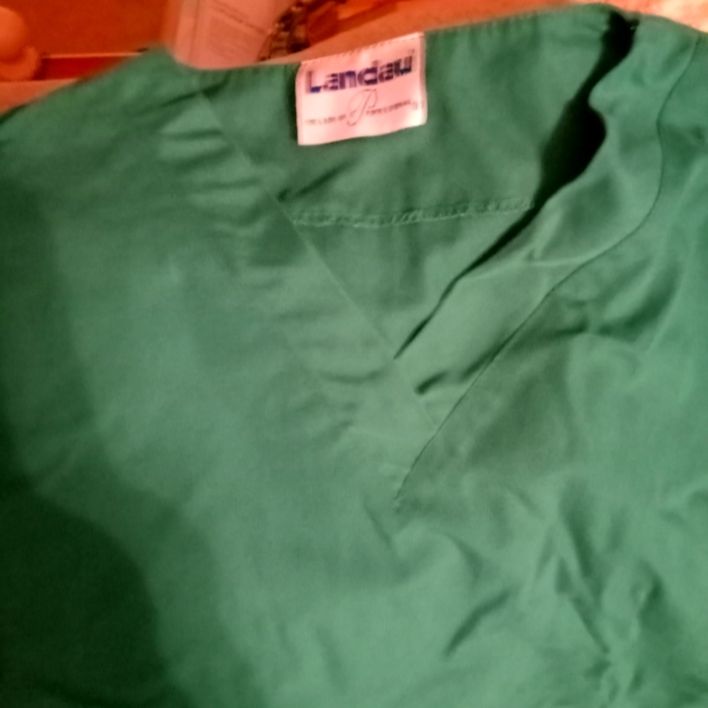 One scrub top and two scuba bottoms